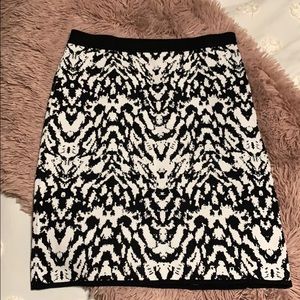 Knee length black and white skirt